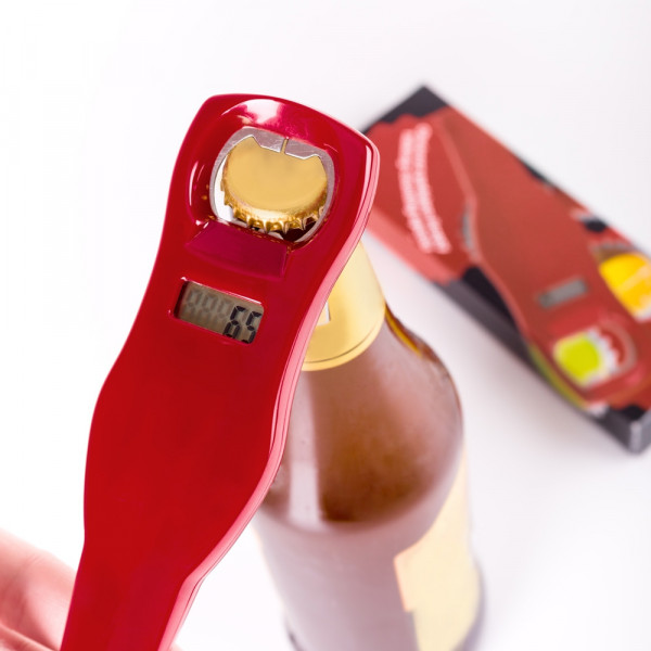 It talks while opening a beer
